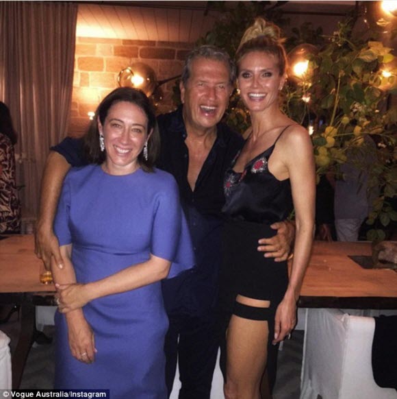Another day, another model! Legendary fashion photographer Mario Testino brought Heidi  along to his official Vogue wrap party held in the Harbour City on Thursday (pictured with editor in chief Edwina McCann)