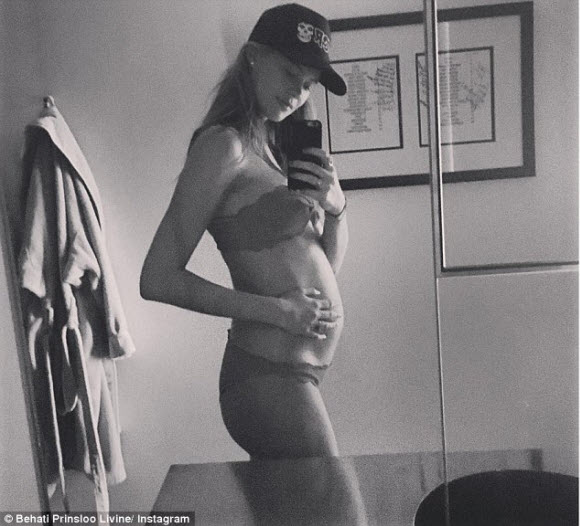 Behati Prinsloo early pregnant in bikini