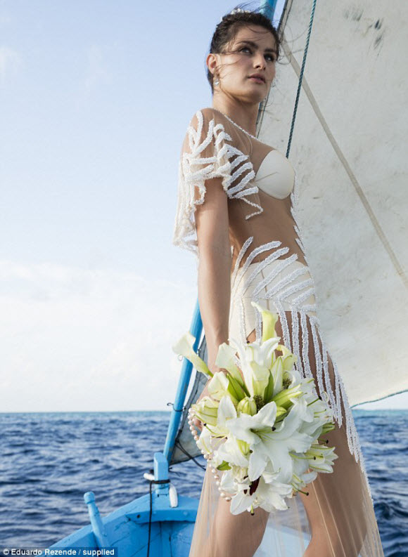 Brazilian model Isabeli Fontana has worn a see through wedding dress