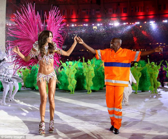 Izabel Goulart reveals almost all of her stunning figure in sexy carnival costume for Olympics Closing Ceremony