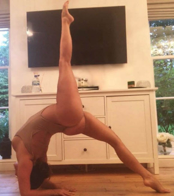 Casey Batchelor Displays Her Incredible Curves In Hot Orange Skimpy Bikini