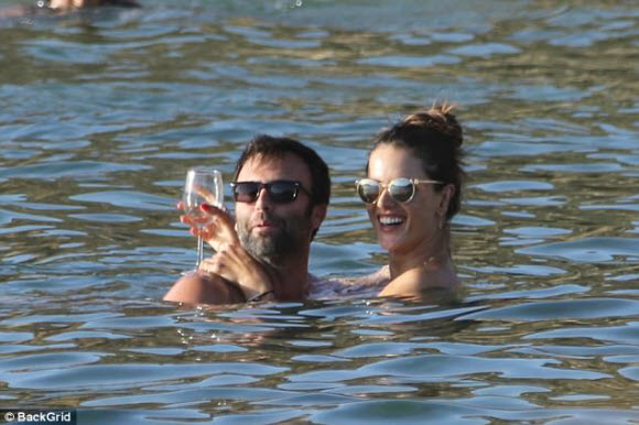Alessandra Ambrosio flaunts her pert derriere in TINY thong bottoms Alessandra Ambrosio flaunts her pert derriere in TINY thong bottoms